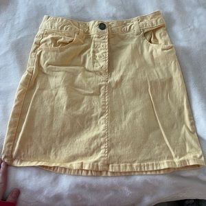 Copper key yellow skirt